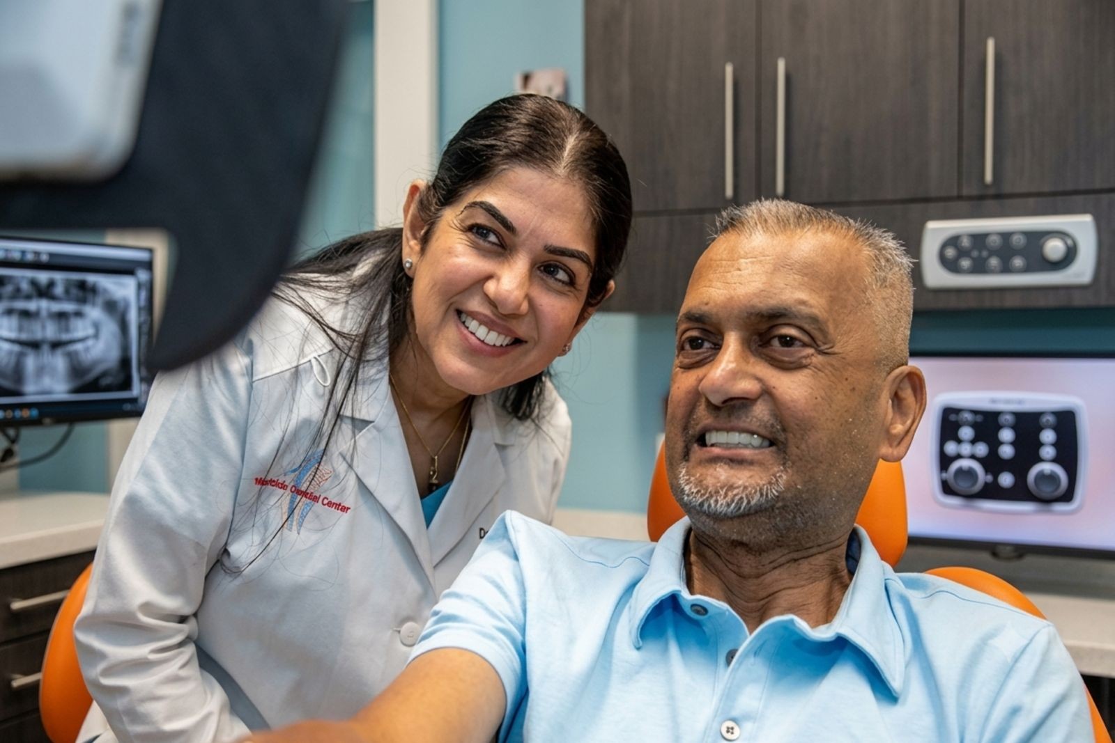 Checking a patient’s smile after cosmetic treatment