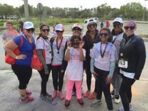 Dr. Dham family and team at race